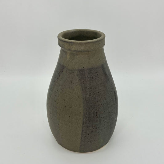 Sturdy, rotund vase with a strong lip. Finished in pour-over pussywillow (brown/gray matte glaze).